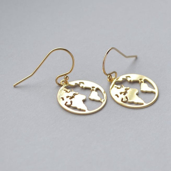 World map earrings for travellers – gold detail
