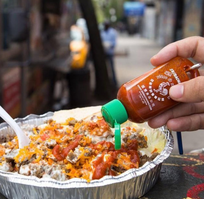 Portable sriracha travel bottle with carabiner