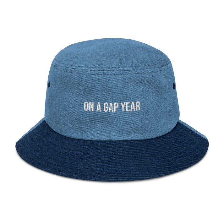 Denim bucket hat front view, travel outfit for women accessory