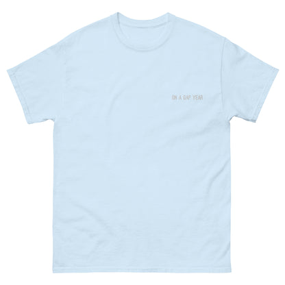 On a gap year t-shirt light blue.  Short sleeve tee for travel enthusiasts.  Unique travel gifts. Travel clothing